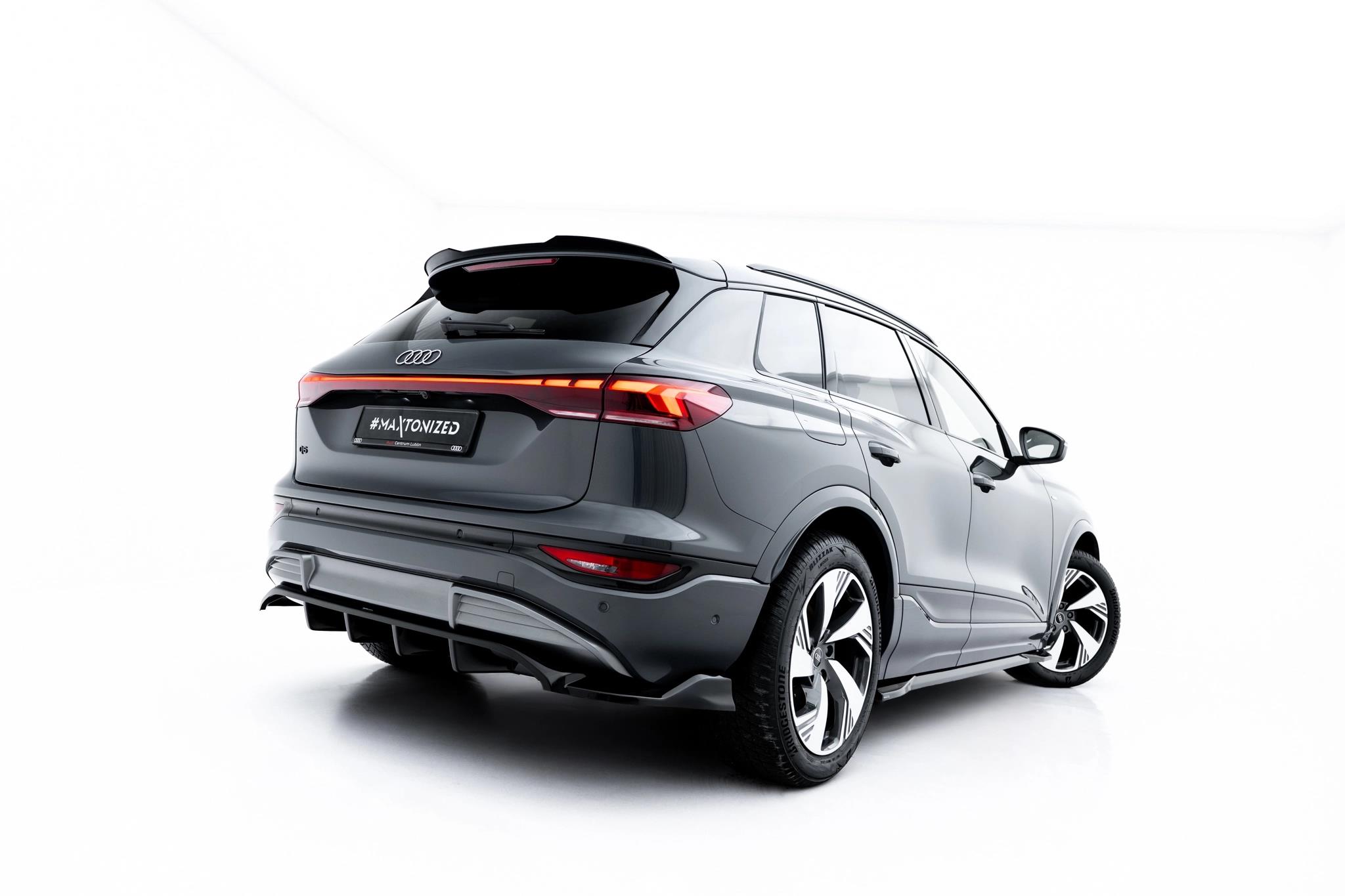 Diffusor Heckansatz passend für Audi Q6 e-tron S-Line / SQ6 e-tron SUV / Sportback Mk1 schwarz Hochglanz
