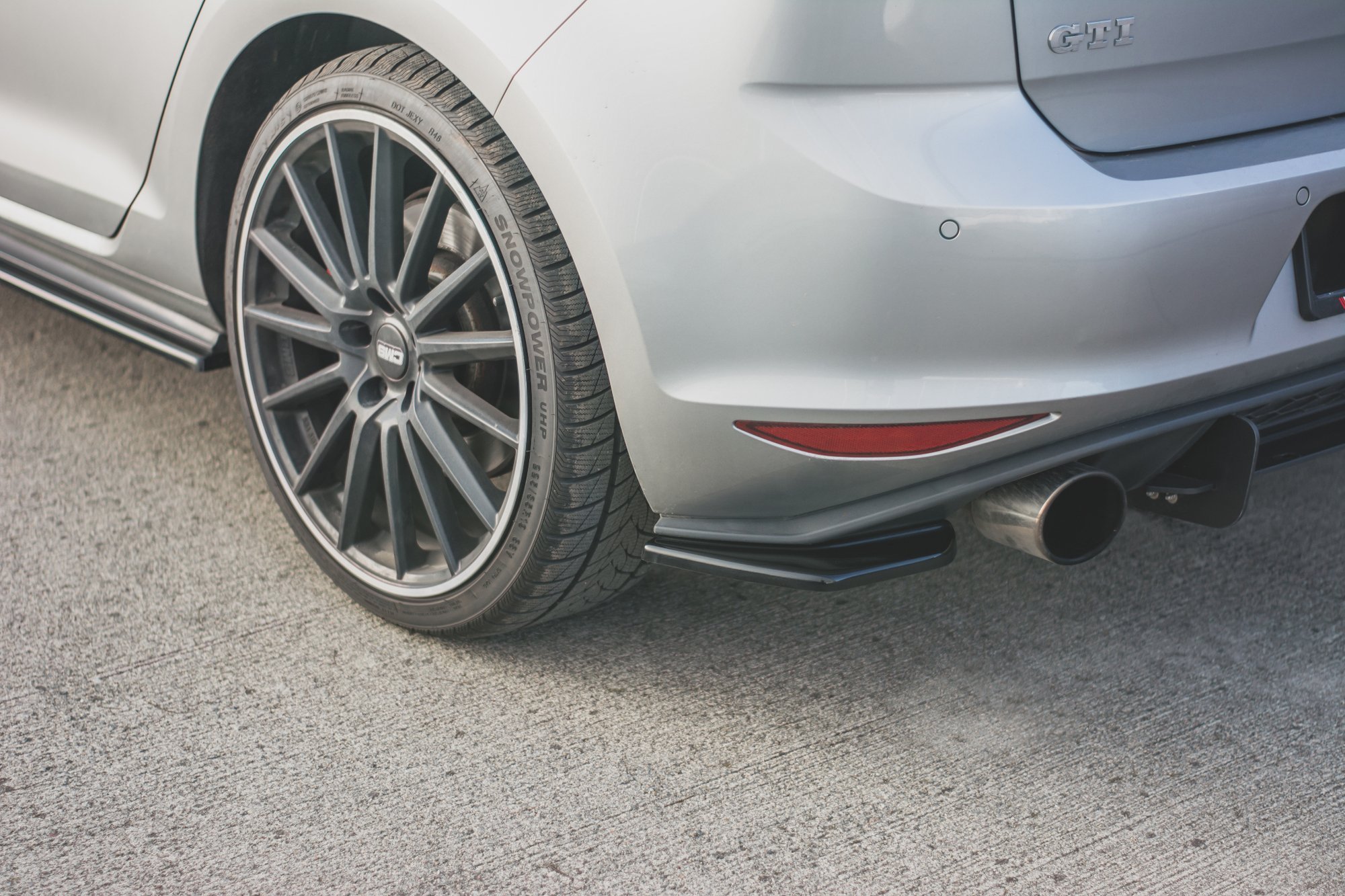 Heck Ansatz Flaps Diffusor V.2 für VW Golf 7 GTI schwarz Hochglanz